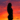 Silhouette d'une femme au coucher de soleil