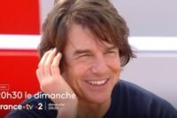 Tom cruise fête ses 64 ans, entre mission impossible et virage dramatique avec iñárritu Tom Cruise souriant lors d'une interview promotionnelle